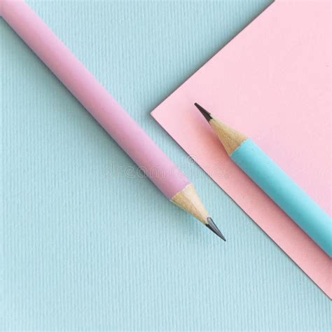 Pastel Colored Pencils On Empty Sheet Blue And Pink Tones Stock Image