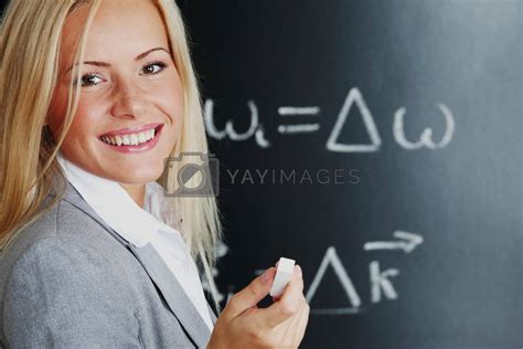 Royalty Free Image Young Woman Teacher In Front Of A Blackboard By