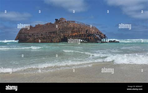 Old Ruined Ship On Beach Stock Photo Alamy