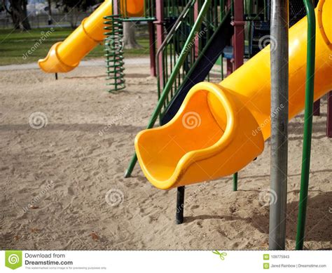 Childrens Playground Equipment In Park With Slide Stock Image Image