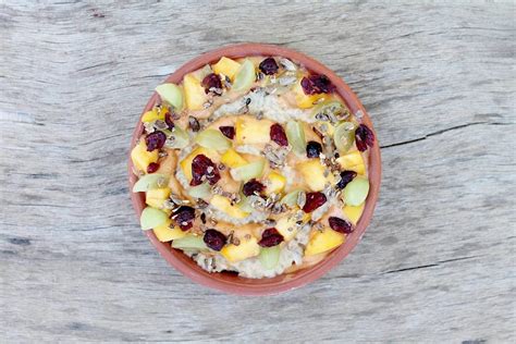 Oatmeal With Tropical Swirl Including Mango And Peach Fluff Grapes