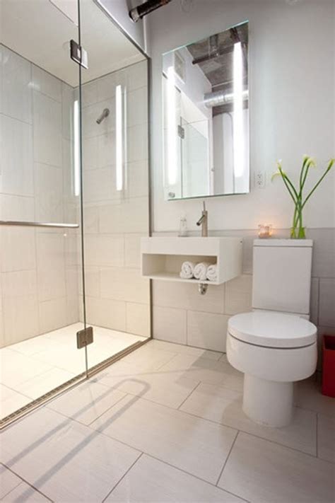 While choosing bathroom tiles for small bathrooms there are few needs to be kept in mind such as you 8142020 black and white bathroom tiles work well in a small bathroom the monochromatic look adds depth. 18 large white bathroom floor tiles ideas and pictures