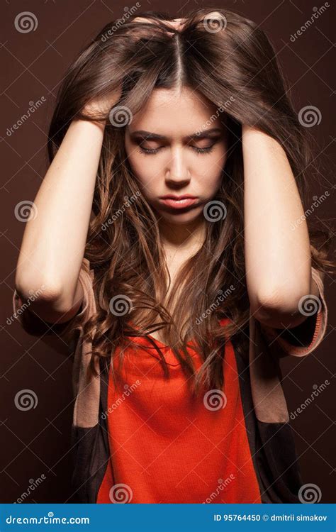 Beautiful Girl With Long Hair Posing In The Studio Stock Photo Image