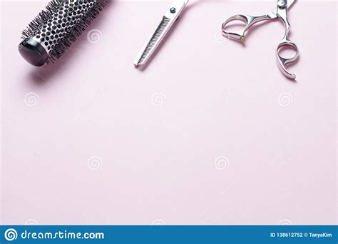 Scissors And Comb On A Pink Background Copy Space Stock Photo Image