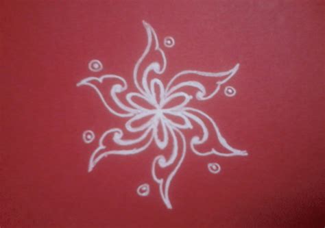 Kolam designs, is an embellishing form of art, a sand painting made using rice powder by women mainly in south india. Top 20 + Latest Simple Kolam Designs With Dots Images