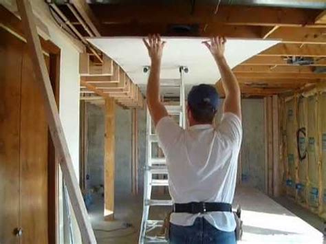 Step by step instructions for installing ceiling drywall. Drywall Tip Hanging the Ceiling - YouTube