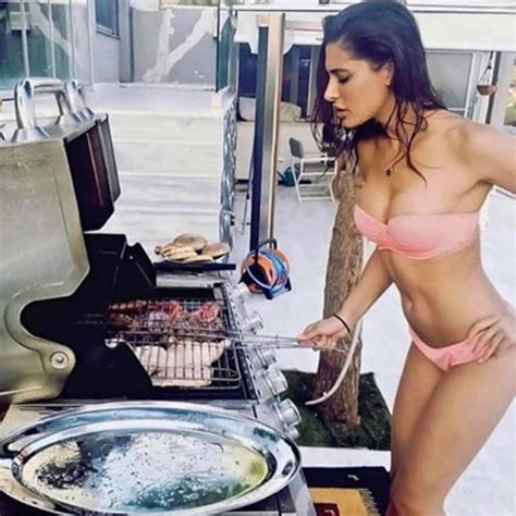 nargis fakhri standing beside a barbeque in a bikini makes for a sexy frame view pics
