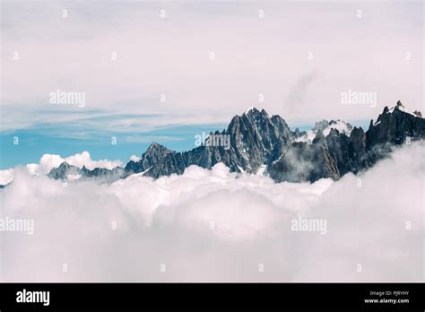 French Alps Above The Clouds Stock Photo Alamy