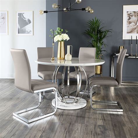 Just what you need for that impromptu dinner party or celebratory whether it's a cosy breakfast for two or a game night set for six, an extendable dining table will give you plenty of room to grow. Savoy Round White Marble and Chrome Dining Table with 4 ...