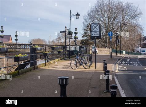 Bikes Parked Up Against A Rail In An Urban City Centre Stock Photo Alamy