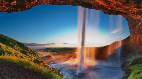 The Flow Of Water Falls From The Yellow Cliff Wallpapers And Images