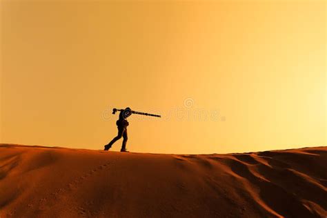 A Man Walking On Sand Desert Stock Image Image Of Extreme Background