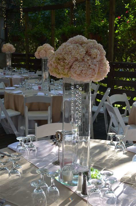 Tall Centerpieces Clear Glass Vase With Rhinestones Hanging With Blush Fluffy Hydrangeas On The