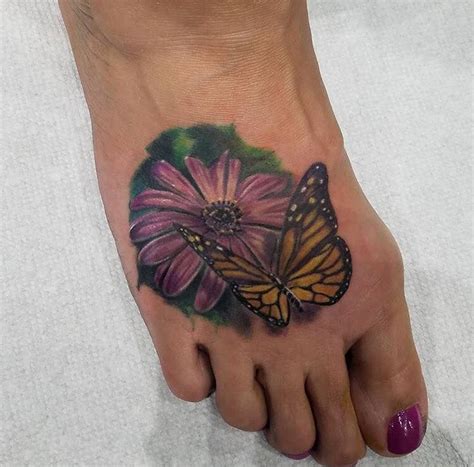 57 Butterfly And Flower Tattoos On Foot Foot Tattoos Tattoos