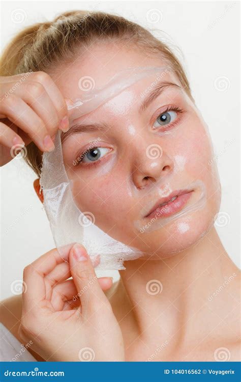 Woman Removing Facial Peel Off Mask Stock Photo Image Of Removal