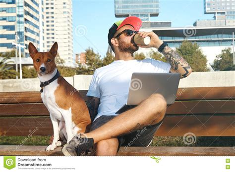 Hipster With Laptop Coffee And Dog Stock Image Image Of Mobile Laptop 76463747