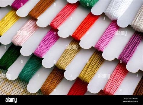 Colored Embroidery Threads On Spools Close Up Stock Photo Alamy