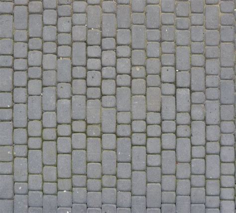 Clean Grey Cobblestone Road Made Of Rectangular Stones With Rounded