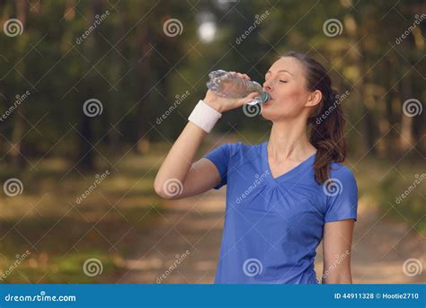Fit Young Woman Drinking Bottled Water Stock Photo Image Of Drinking