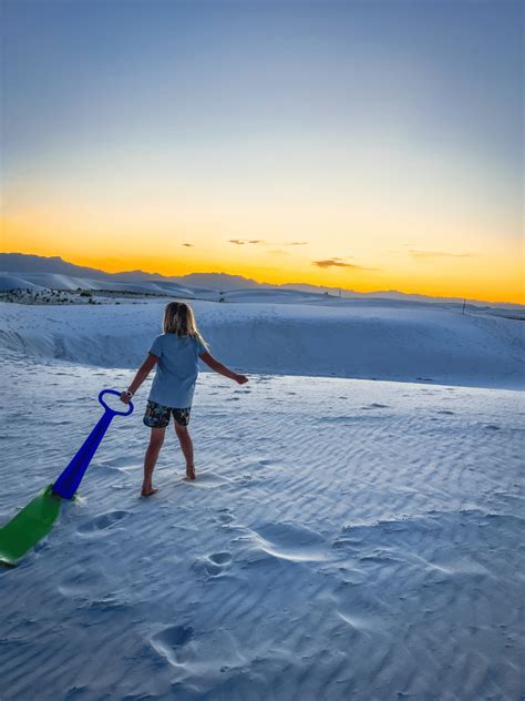 Pulling Sled At White Sands National Park At Sunset Raising Hikers