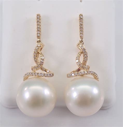 12 mm pearl and diamond dangle drop earrings 14k yellow gold june birthday wedding