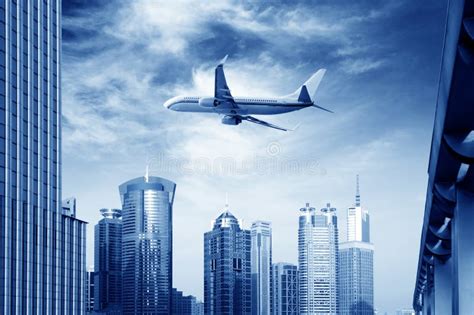 Airplane Over The City Stock Image Image Of Tower Takeoff 24695225