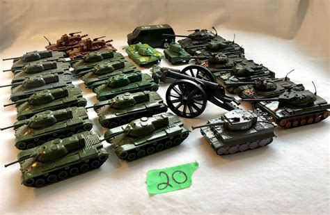 Large Lot Of Plastic Toy Tanks Cannons Etc