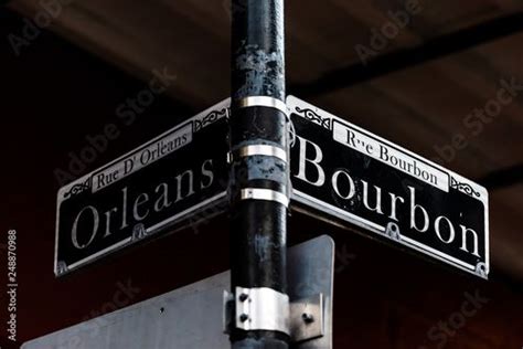 Orleans And Bourbon Streets Sign Intersection Text In New Orleans On