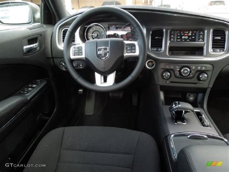 This is powered by a 383 v8 that ispaired with. Dodge Charger 2014 Black Interior