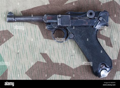 Luger P08 Parabellum Handgun On Camouflaged Background Stock Photo Alamy
