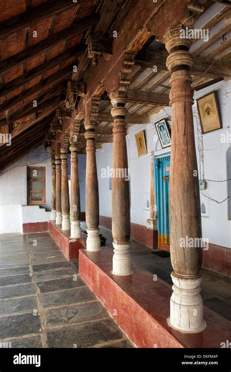 Traditional South Indian House With Large Wooden Pillared Veranda