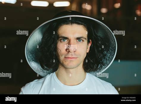 Portrait Of A Young Man In Strange Unusual Hat Stock Photo Alamy