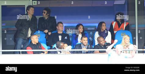 carla higgs wife of manchester city s vincent kompany sits with his father and brother in a