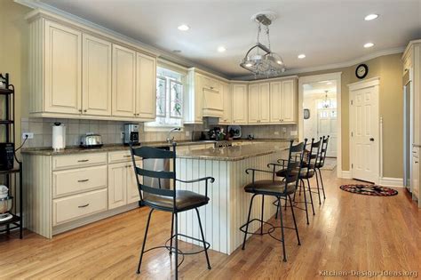Small kitchens with white cabinets can help your space look bigger, and brighter, which can enhance the entire atmosphere of your room. Pictures of Kitchens - Traditional - Off-White Antique Kitchen Cabinets (Page 2)