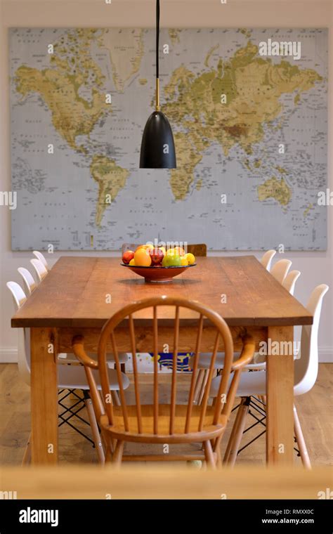 Dining Room Table With Wall Map Stock Photo Alamy