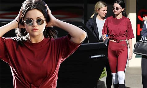 Selena Gomez Wows In All Red As She Flashes Hint Of Torso After Leaving