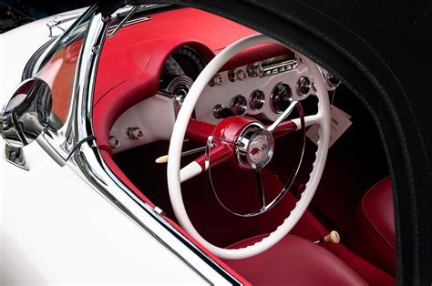 The Steering Wheel And Dashboard Of A 1950s Chevrolet Corvette C1 1c8