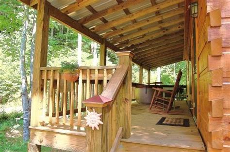 Inside you will find an open living, dining, and kitchen area with cathedral ceilings and hardwood floors. Hot Springs nc honeymoon cabin w hot tub on creek UPDATED ...