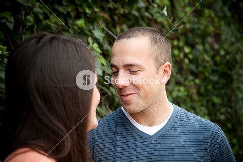 Young Happy Couple Enjoying Each Others Company Outdoors Royalty Free