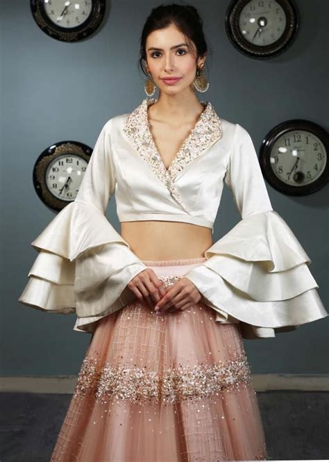 White Satin Blouse With Layered Frill Sleeves Paired With Peach Net