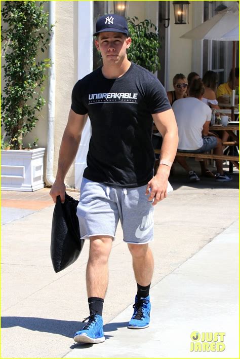 full sized photo of nick jonas shows off his buff arm muscles after a workout 06 nick jonas