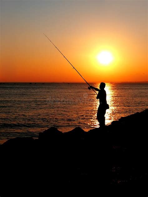 Fisherman At Sunset Stock Photo Image Of Fisherman Serenity 13605606