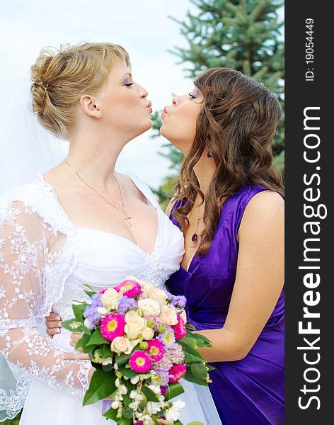 Bride And Bridesmaid Kissing Free Stock Images And Photos 19054449