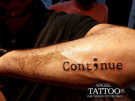 Continue tattoo | Angel tattoo designs, Tattoo designs, Tattoo prices