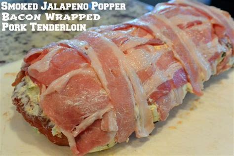 Fancy enough for a dinner party, but easy to make. Smoked jalapeño popper bacon wrapped pork tenderloin. This recipe is amazing, especially if y ...