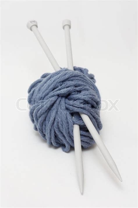 A Blue Ball Of Yarn And Sticks On A Stock Photo Colourbox
