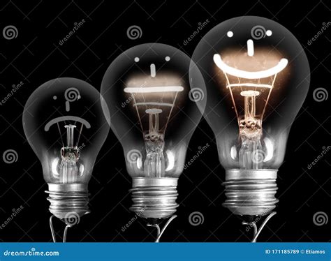 Dark And Shining Light Bulbs With Positive And Negative Emotion Stock