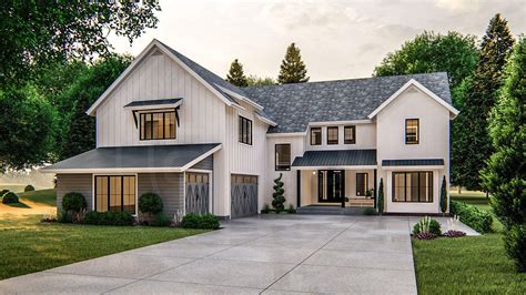 This 2 Story Modern Farmhouse Plan Is Highlighted On The Exterior By