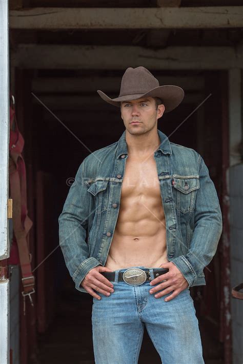 All American Shirtless Cowboy On A Ranch Cowboy With A Denim Jacket And No Shirt In A Barn Rob