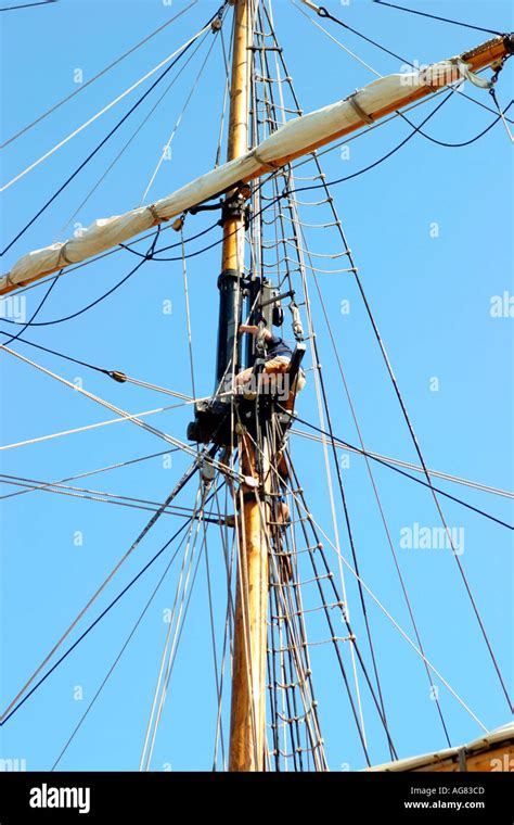 A Tall Ship Rigging Mast Against The Blue Sky Stock Photo Alamy